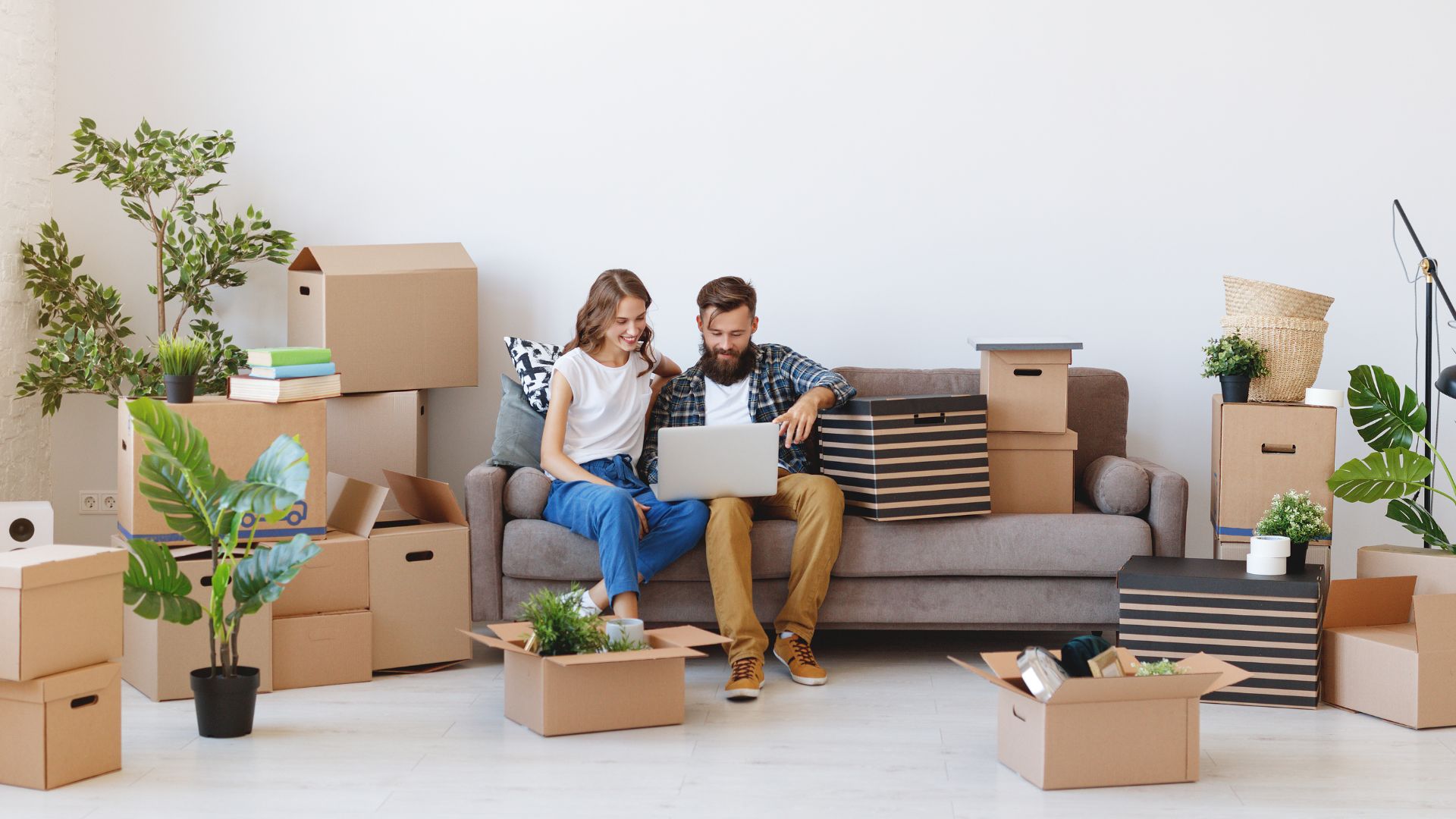 "Couple booking Quick Mover Oman professional moving and packing services in Muscat