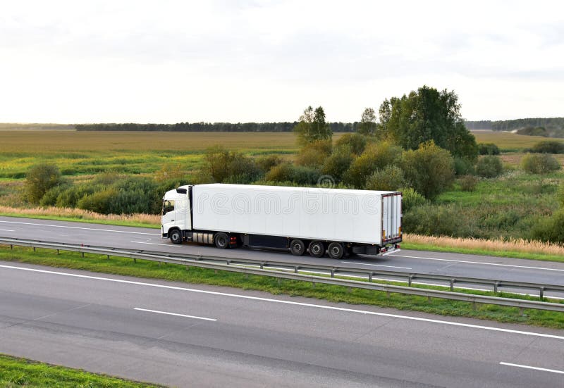 Moving truck on the road in Muscat for packing and unpacking relocation services